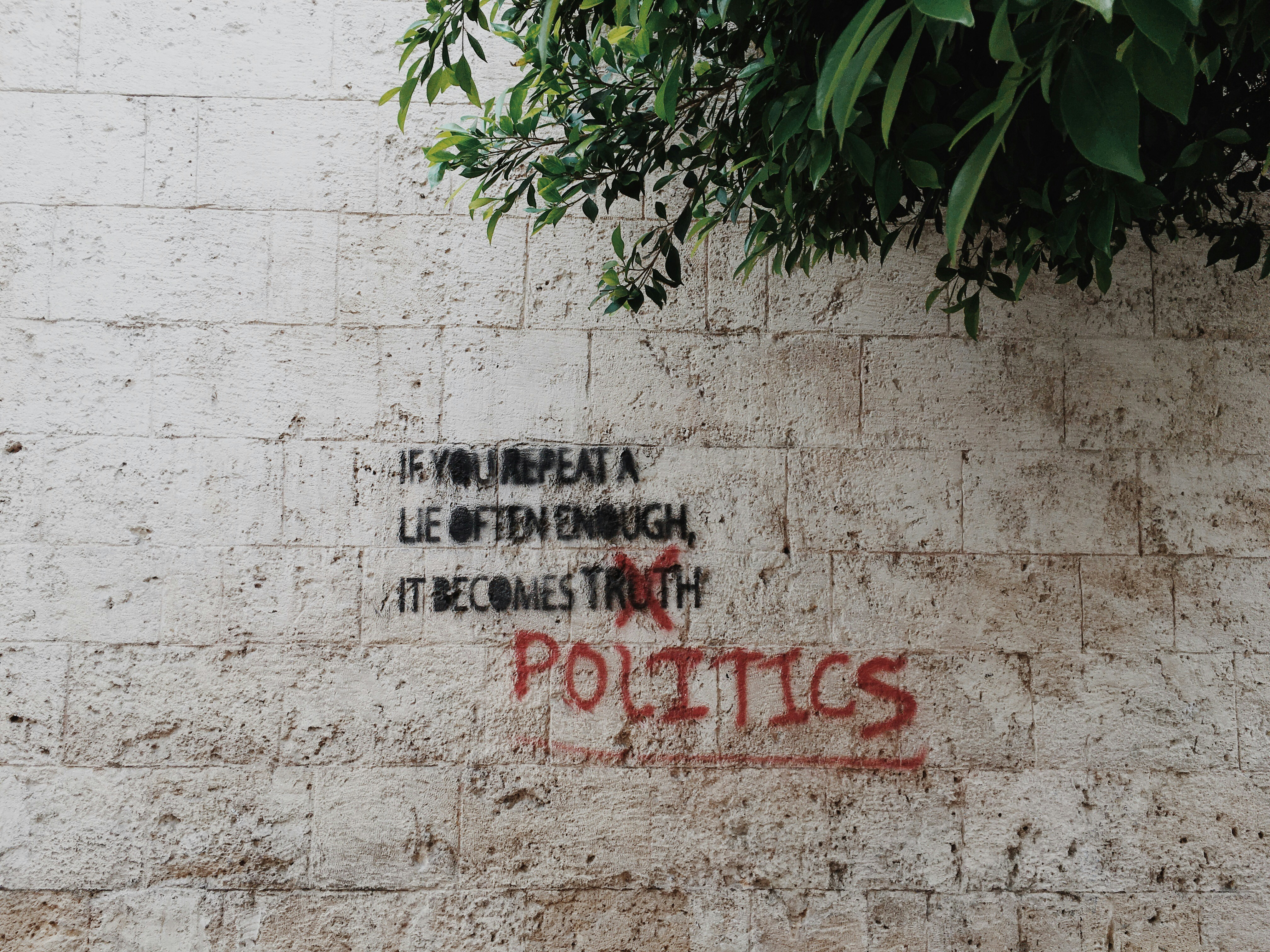 Political graffiti on a stone wall